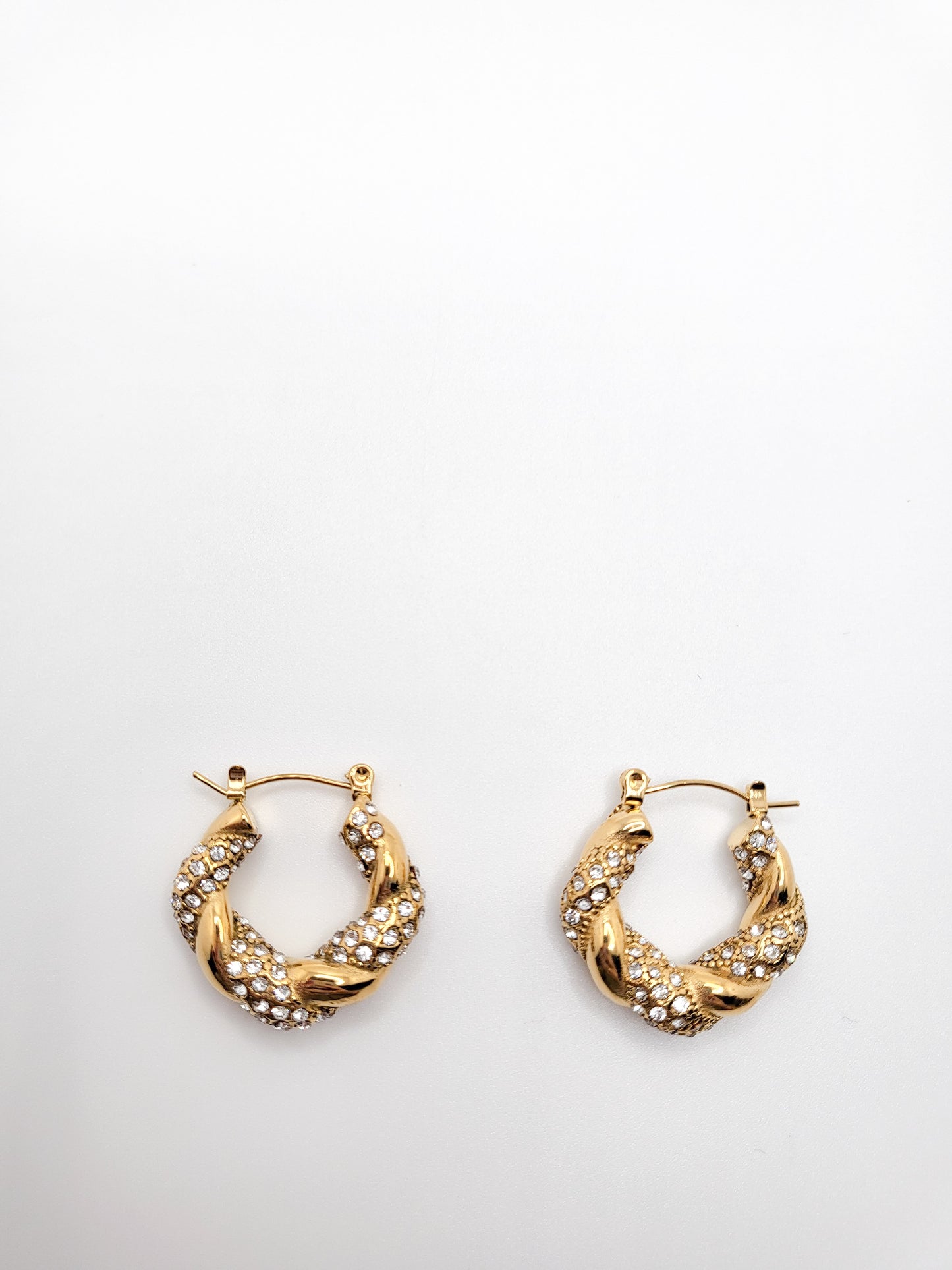 Gold plated twisted hoops with zircons