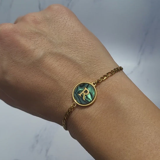 Gold plated cuban chain bracelet with initial letter.