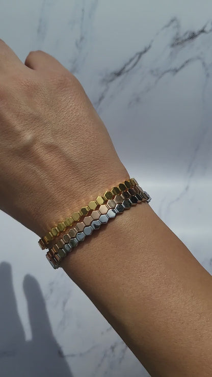 Rose gold, gold and silver color bracelets. Stainless steel. Sold separately. Claw setting.
