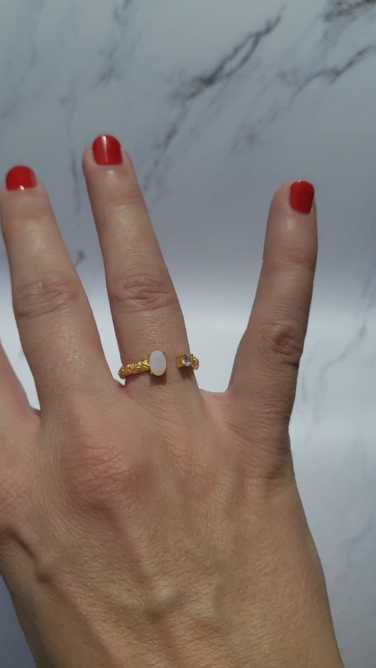18k gold plated 925 sterling silver ring. Adjustable.