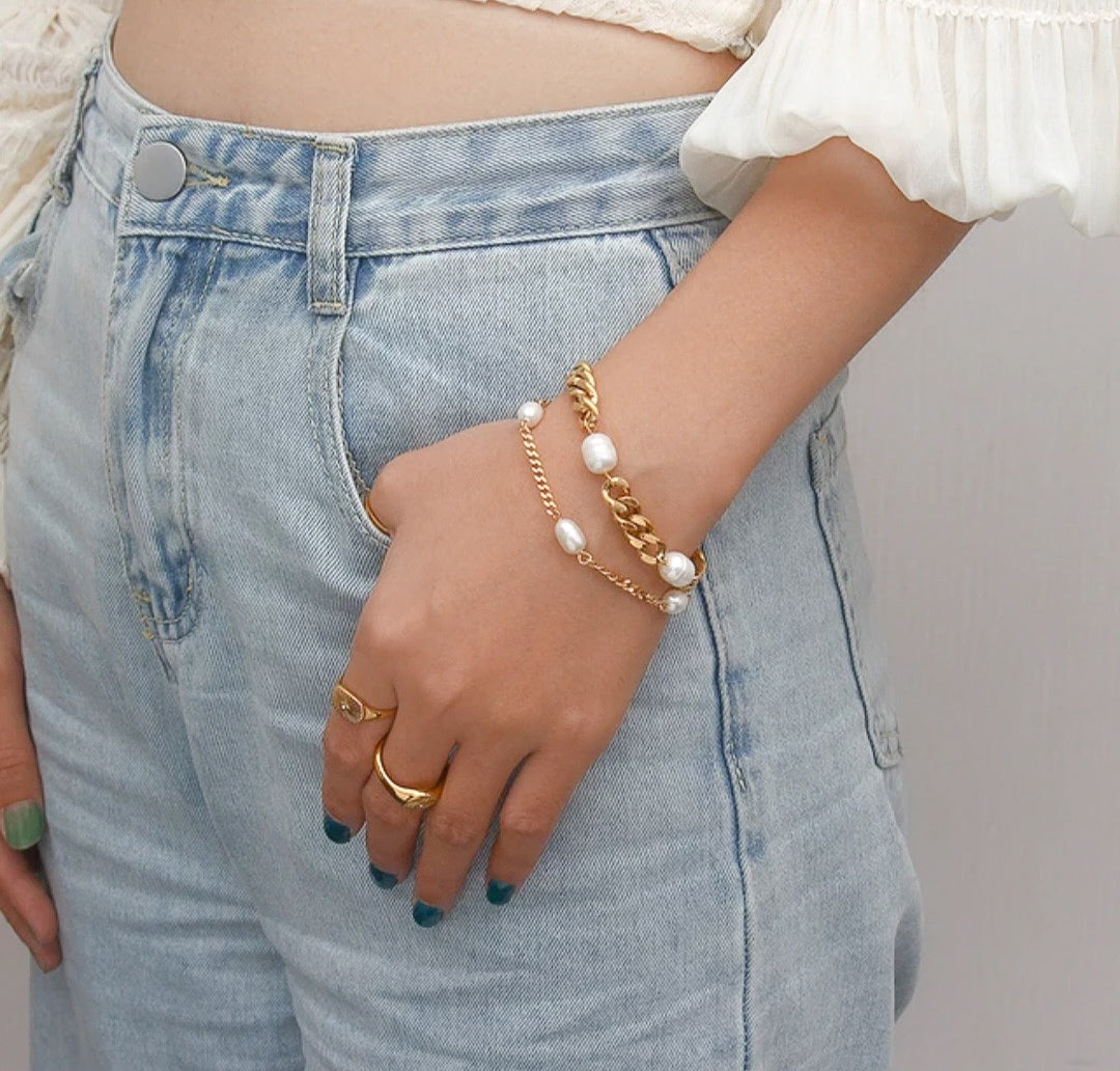Gold plated bracelets on a girl