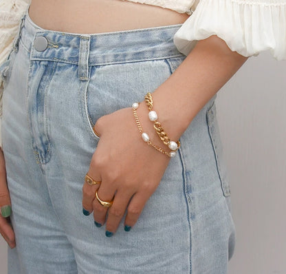 Gold plated bracelets on a girl