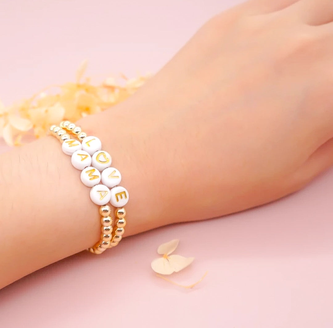 Mama and love bead bracelets on hand