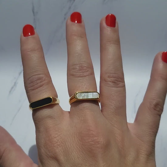 Gold plated rectangle statement ring. Available in color black or white.