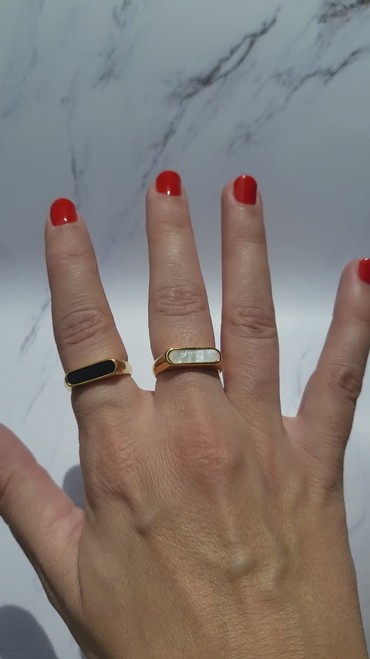 Gold plated rectangle statement ring. Available in color black or white.