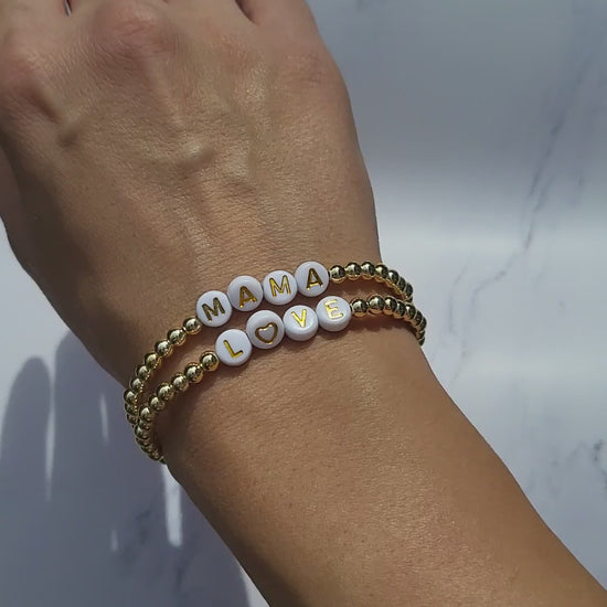 Bead stretch bracelet with LOVE or MAMA. Sold separately.