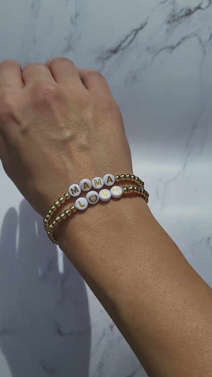 Bead stretch bracelet with LOVE or MAMA. Sold separately.